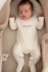Macacão Bebê Malha Tricotada com Tule e Bordado Floral Off White — foto 1