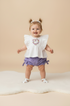 Conjunto Infantil Bata Branca Bordada e Shorts Lilás — foto 1
